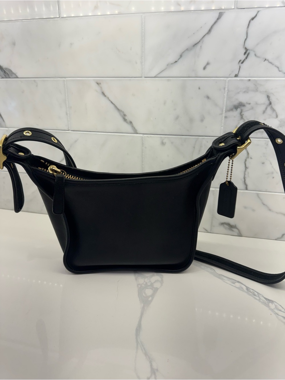 Coach Janice Legacy Reissue shoulder hobo bag.